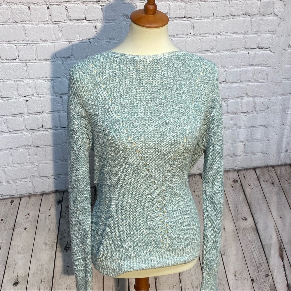 White and teal knit sweater